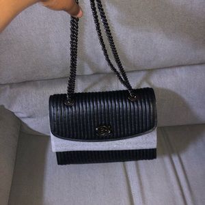 COACH
Parker Studded Quilted Leather Bag